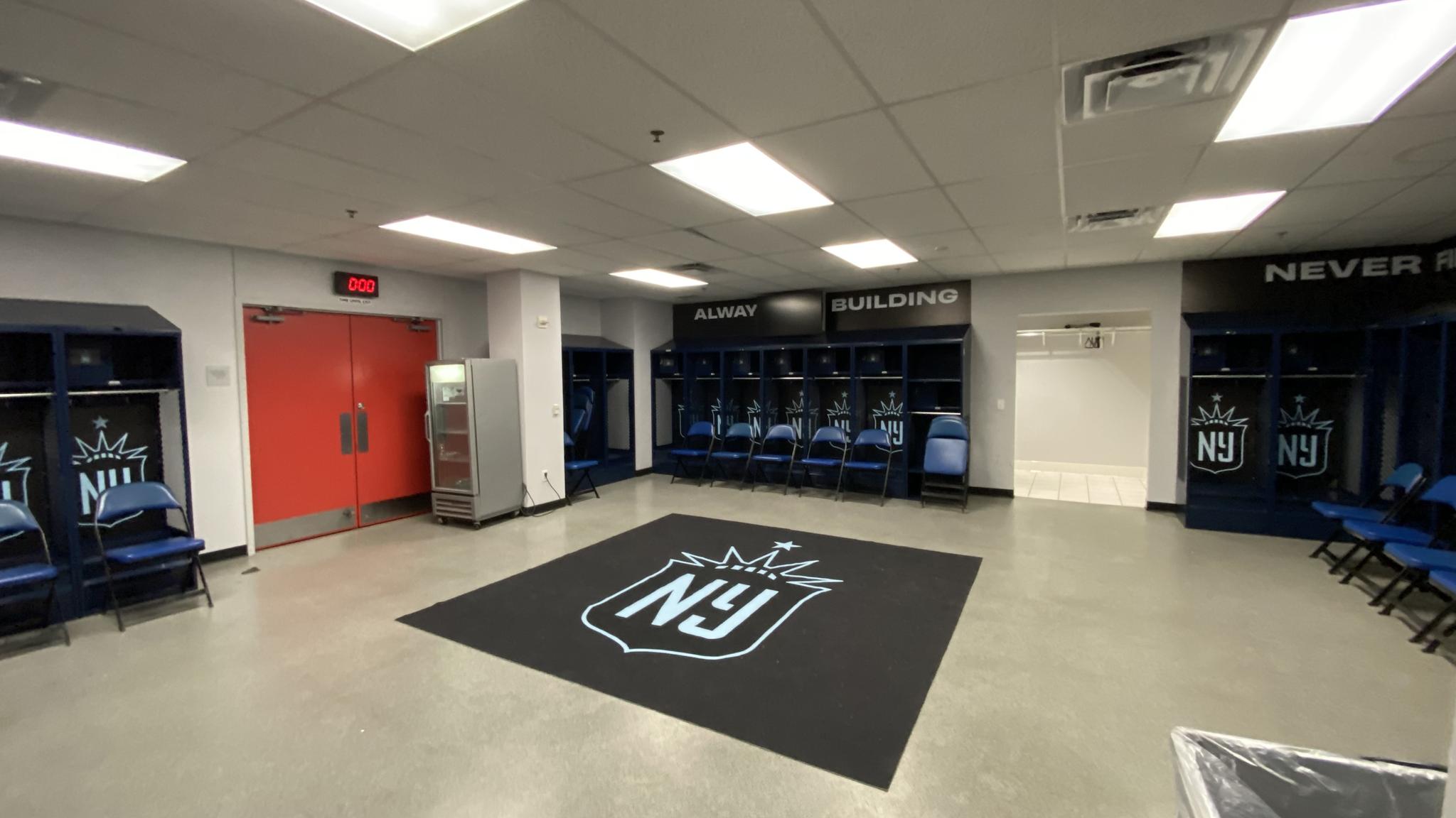 A photo of a locker room with Gotham FC logos