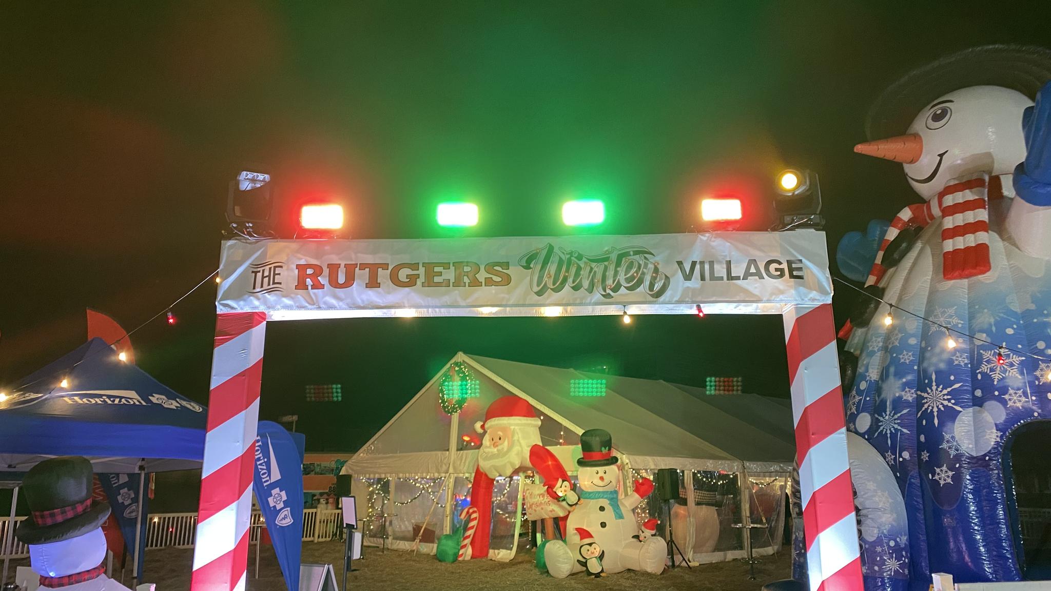 A banner with the words "The Rutgers Winter Village" in different fonts