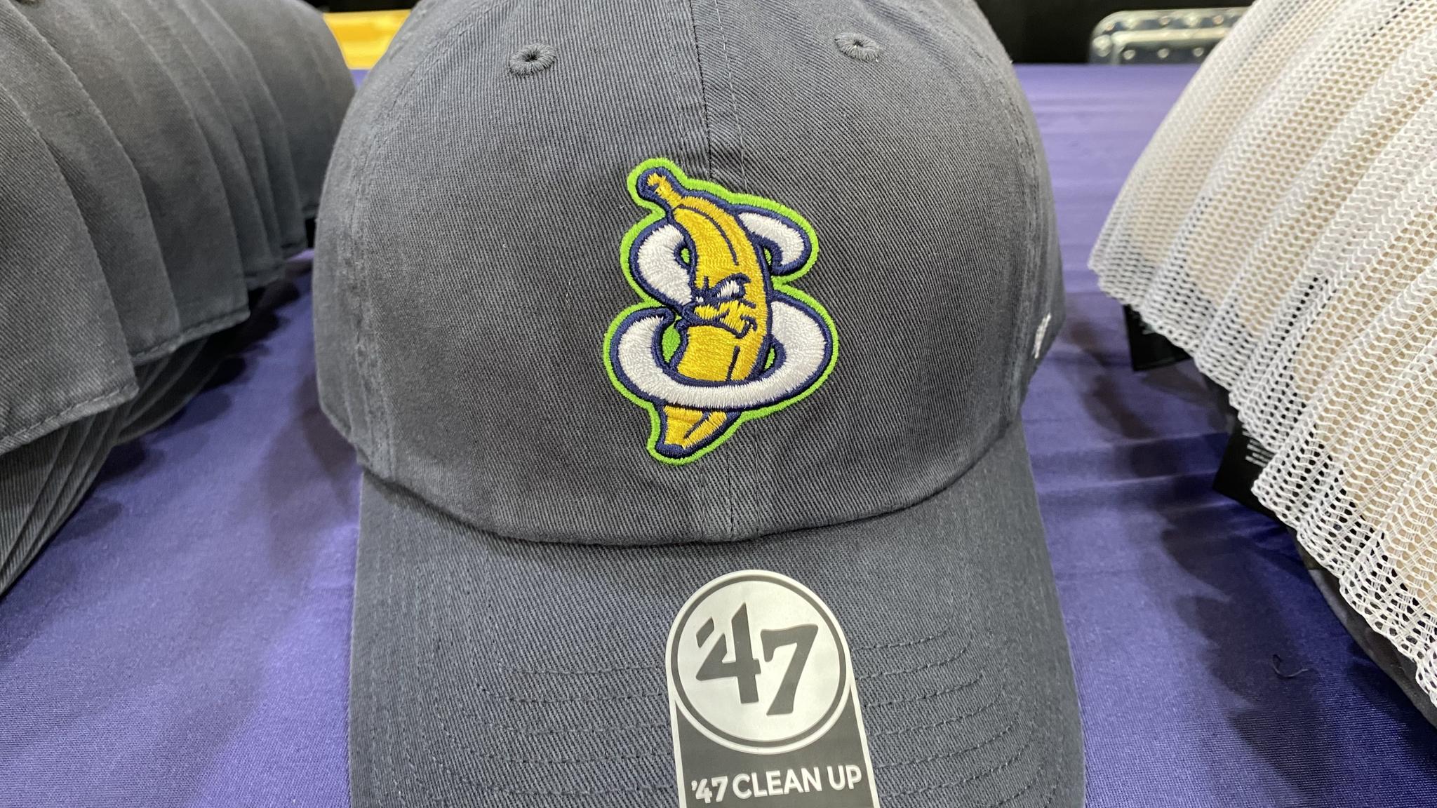 An image of a hat with the letter "S" wrapping around a Banana logo