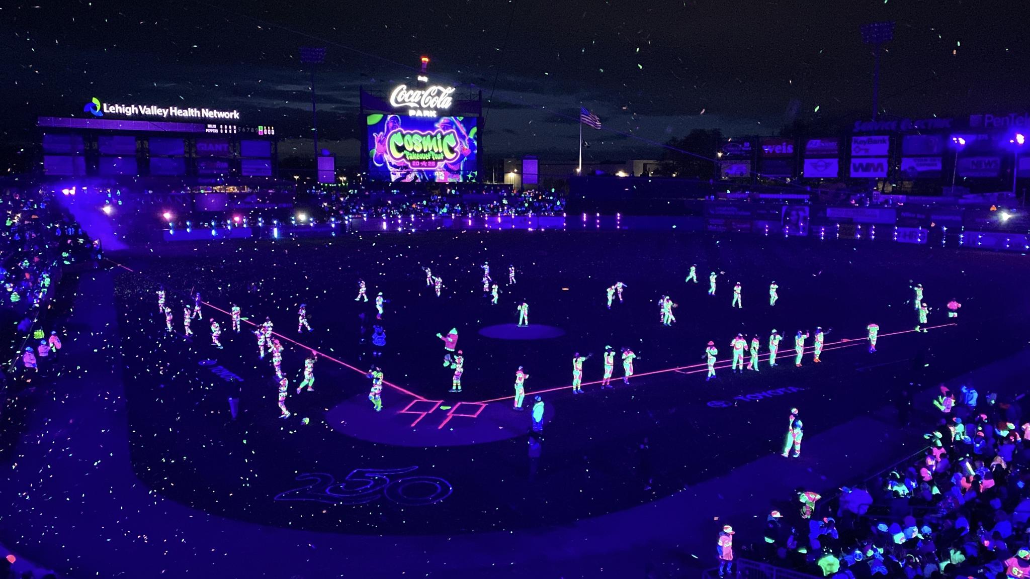 An image of Coca-Cola Park lit in UV Black Lights