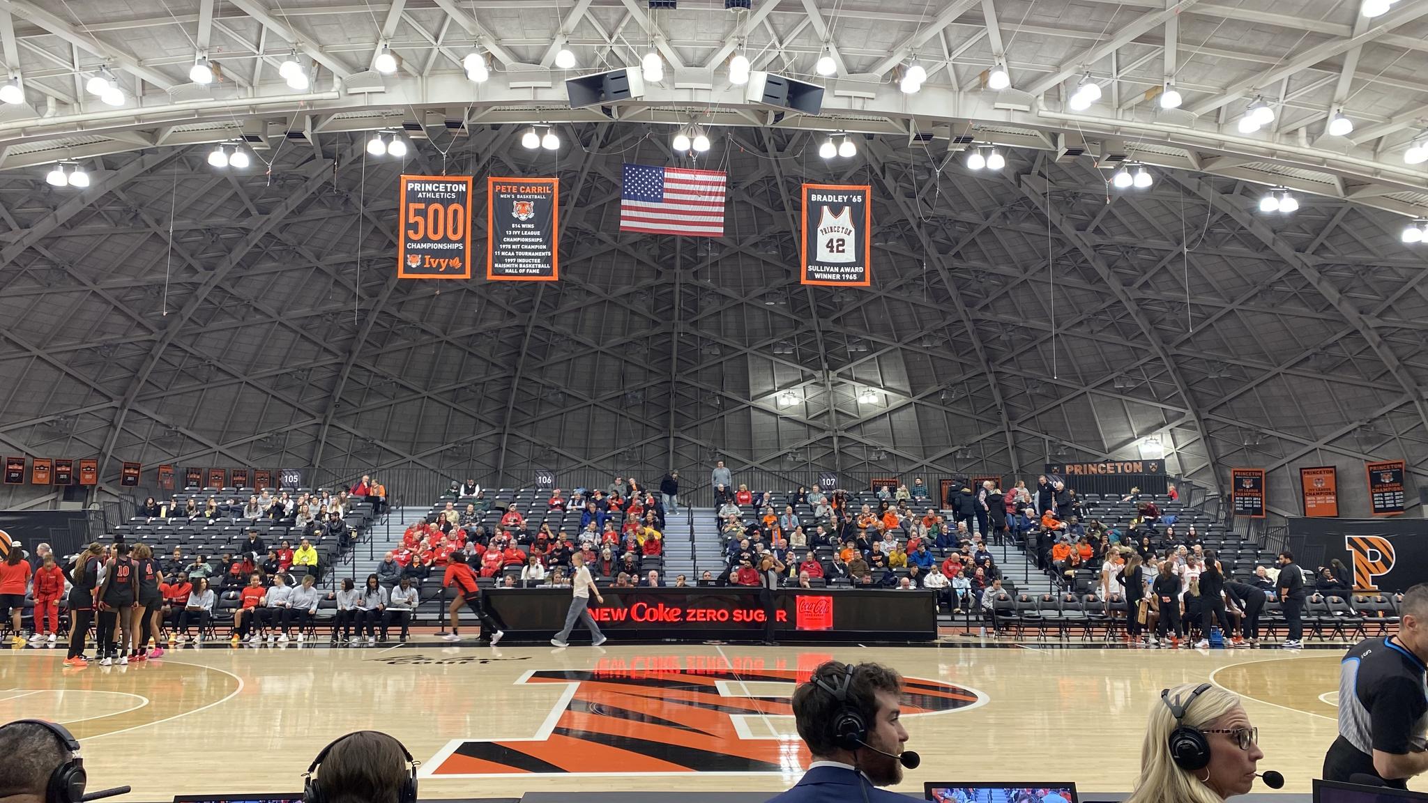 A photo of game action taken from the first few rows of the lower seating area at Jadwin Gymnasiumm