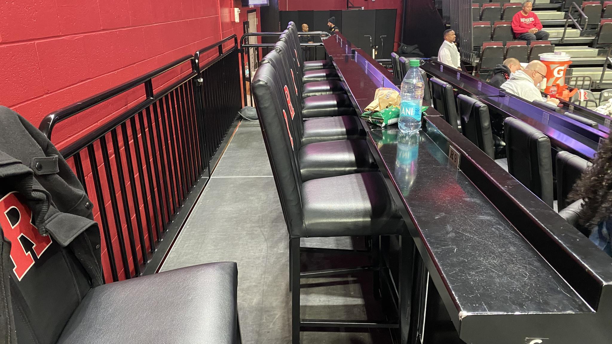 A photo of a row of "loge seats" at one end of the court at Jersey Mike's Arena