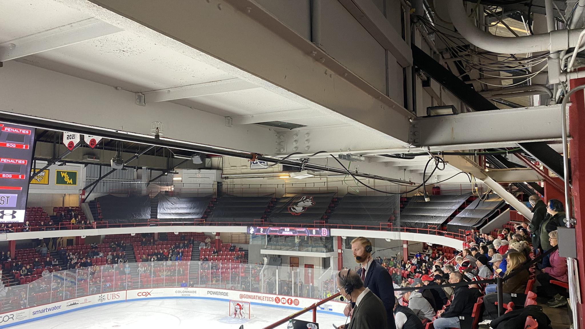 An image of tarped-off sections of the upper deck at Matthews Arena