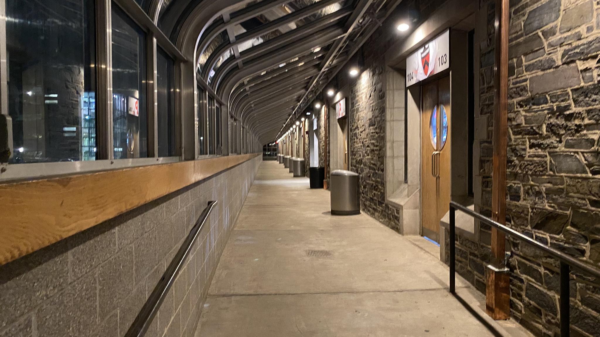 One of the greenhouse glass enclosed hallways at Hobey Baker Rink. This one features doors blocking the view of the hallway from the seating bowl.