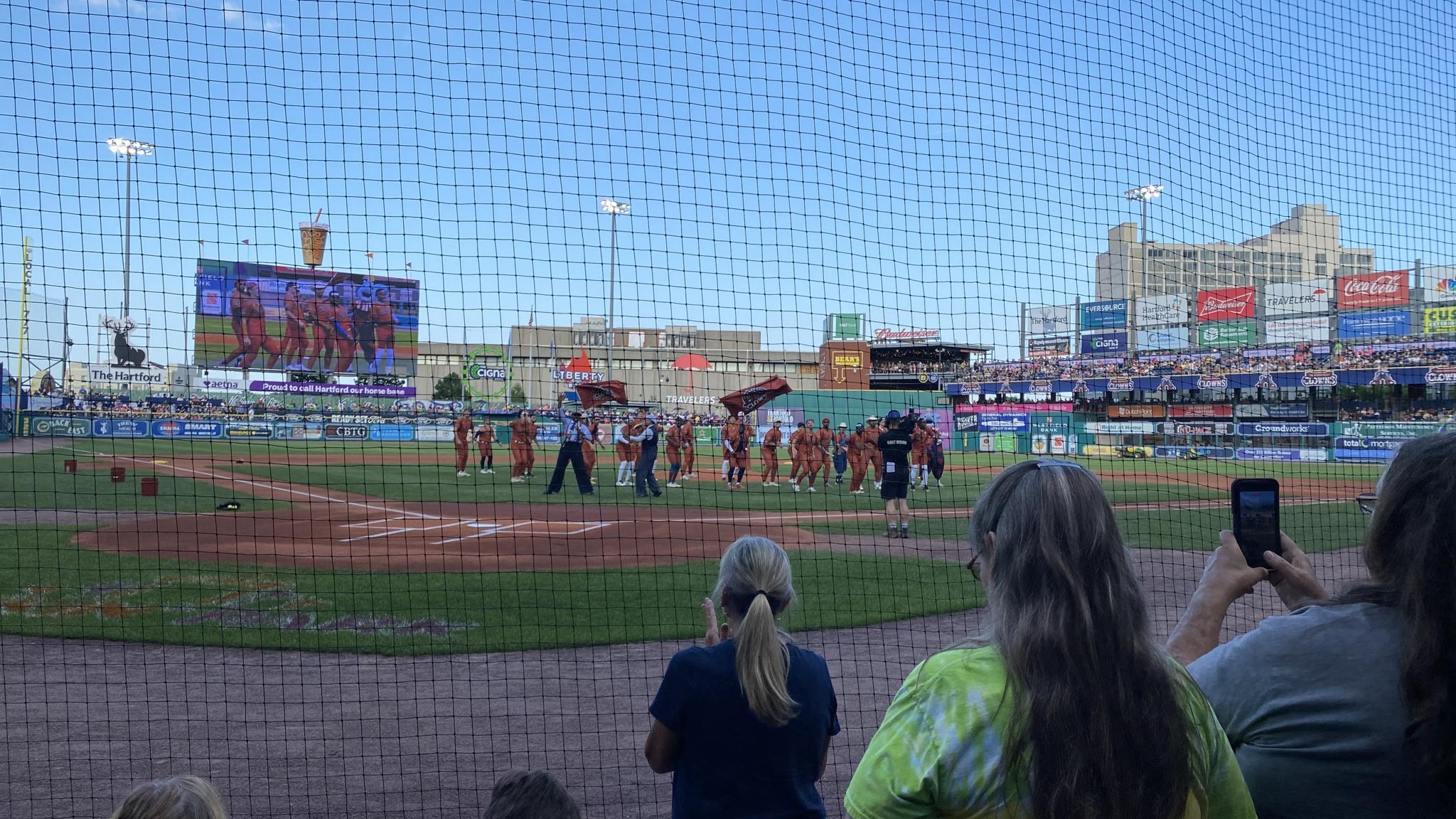 An image of the Indianapolis Clowns being introduced at Dunkin Park from one of the front rows