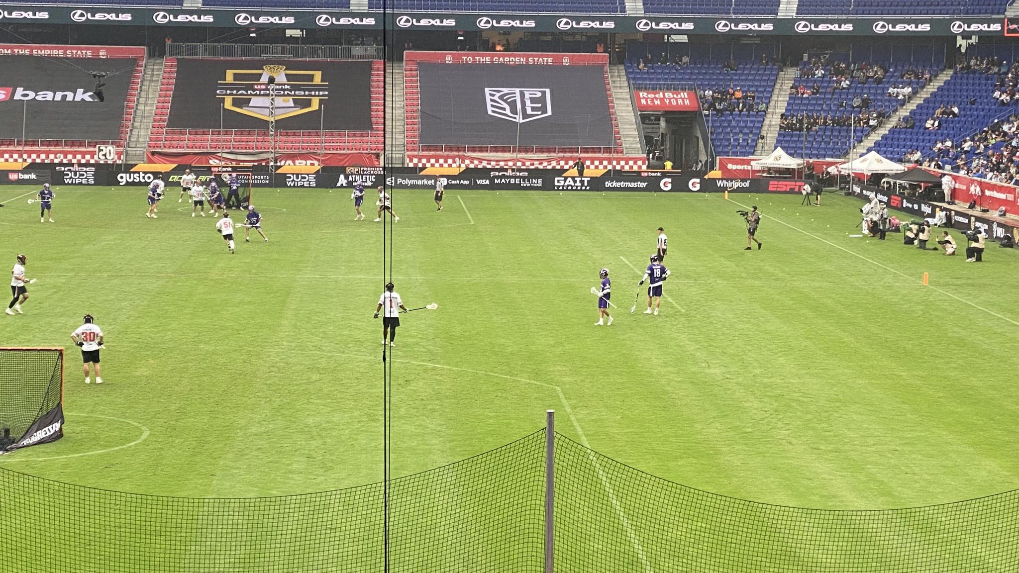 An image of players on a lacrosse field