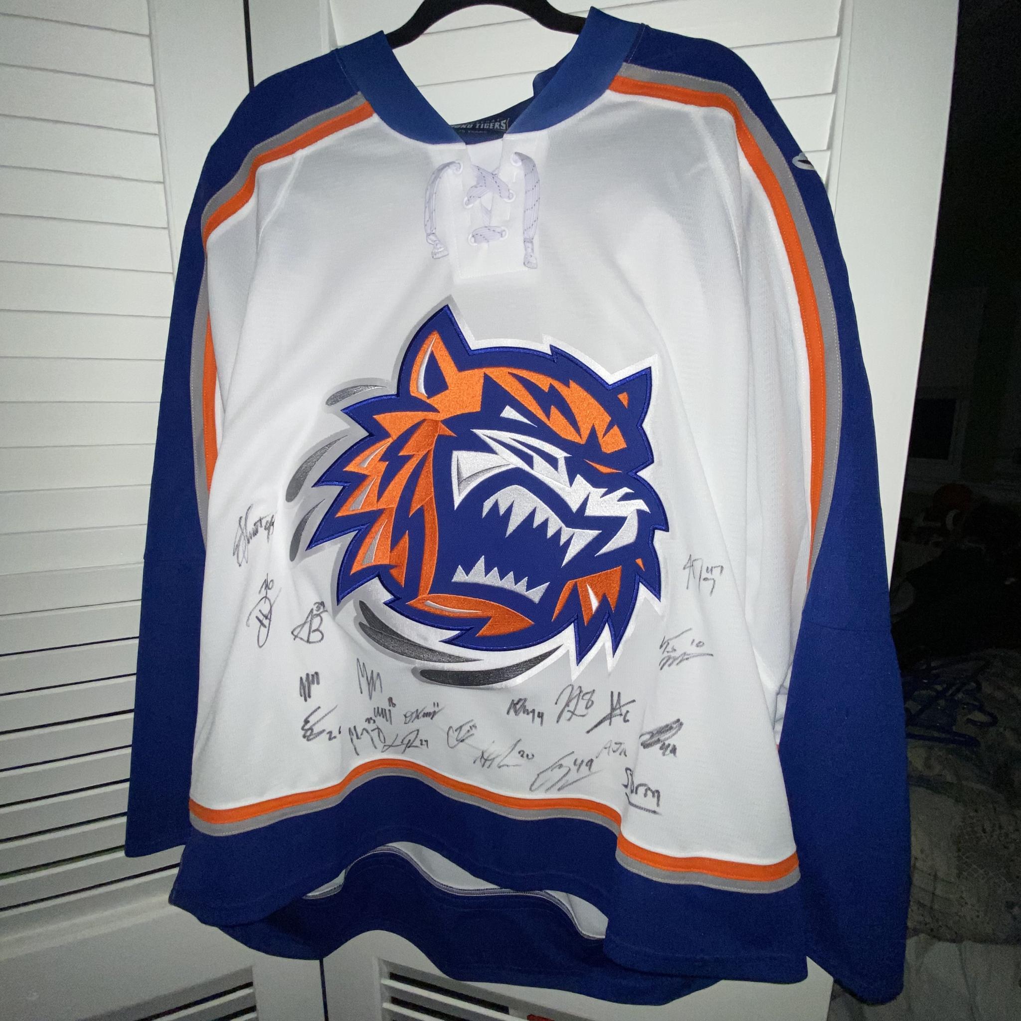 A photo of a Bridgeport Sound Tigers jersey signed by the team