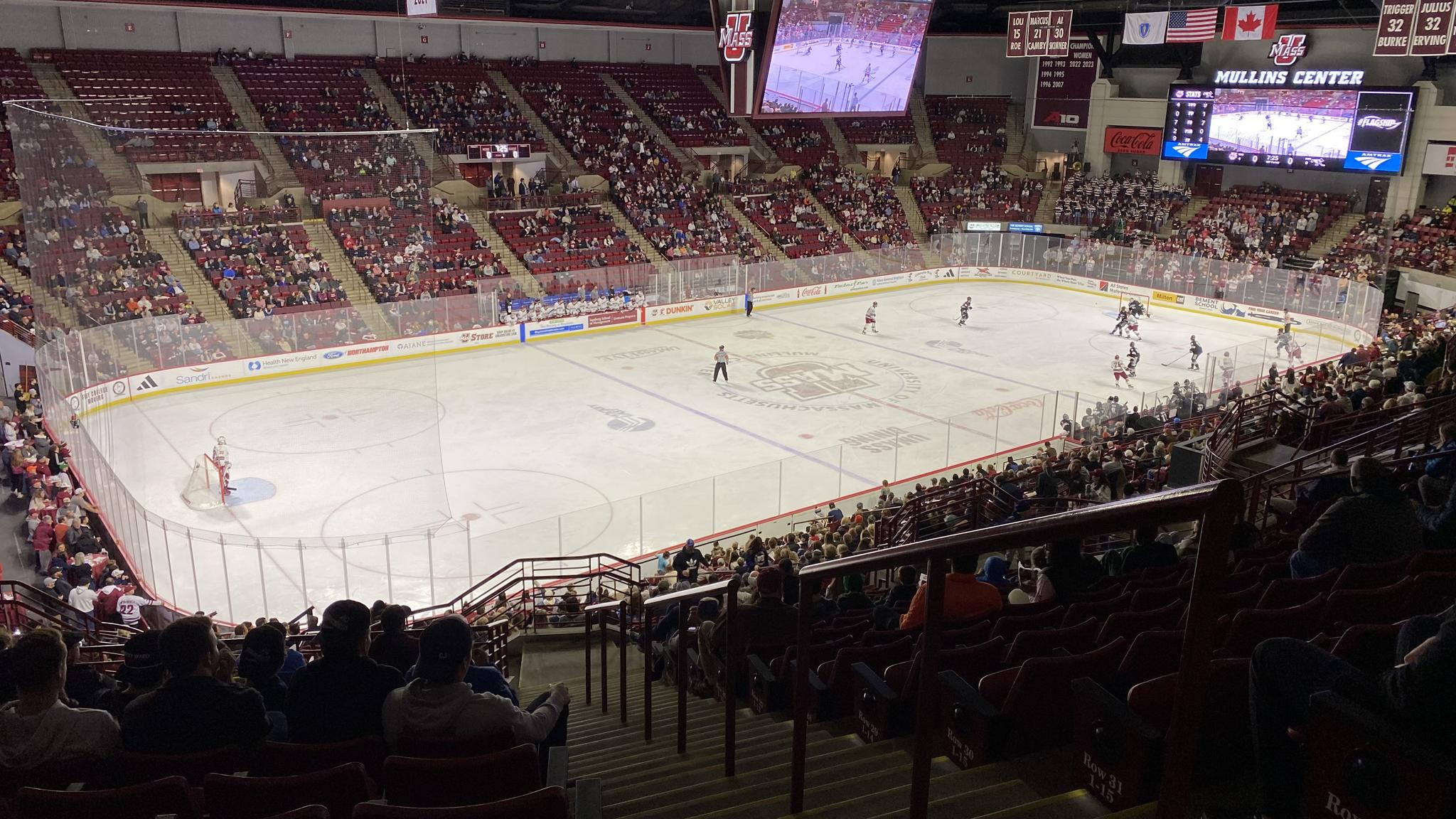 A photo of the Mullins Center during a hockey game